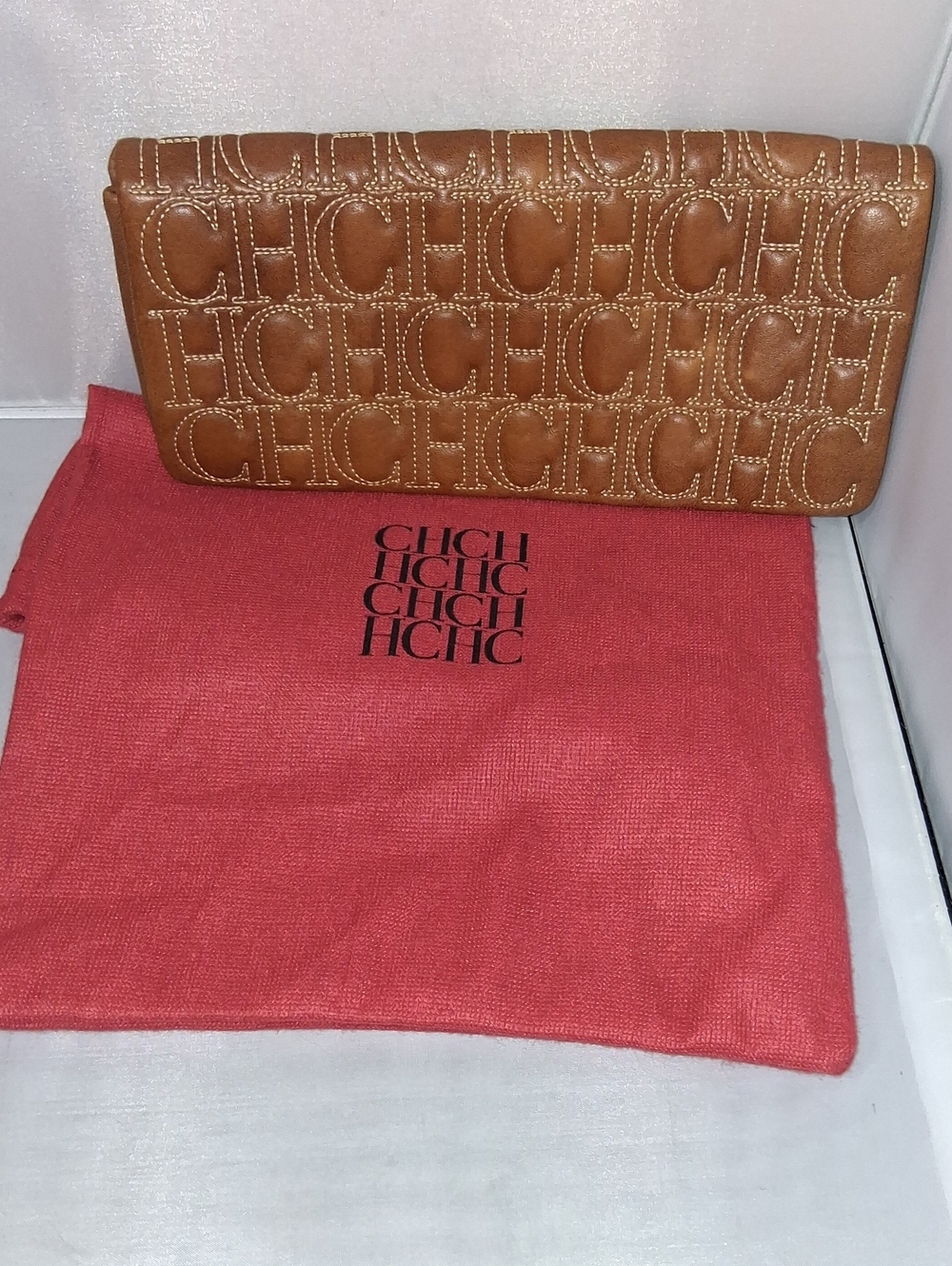 Carolina Herrera glove keather clutch